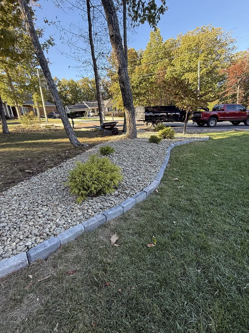 Finished hardscape and planting bed showing design execution